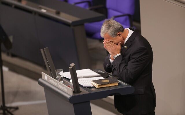 Knessset Speaker MK Mickey Levy breaks down in tears during a ceremony to mark International Holocaust Remembrance Day held in the Bundestag, the German Parliament, January 27, 2022. (Courtesy Boaz Arad) Knessset Speaker MK Mickey Levy breaks down in tears during a ceremony to mark International Holocaust Remembrance Day held in the Bundestag, the German Parliament, January 27, 2022. (Courtesy Boaz Arad)
