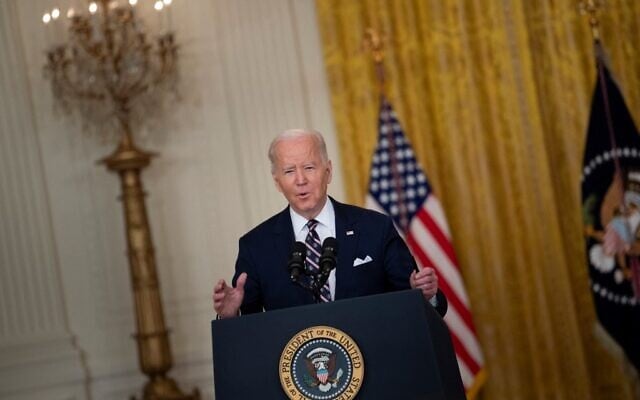 US President Joe Biden speaks in the East Room of the White House about Russian military activity near Ukraine, on February 22, 2022, in Washington, DC. (Brendan Smialowski/AFP) US President Joe Biden speaks in the East Room of the White House about Russian military activity near Ukraine, on February 22, 2022, in Washington, DC. (Brendan Smialowski/AFP)