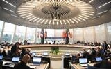 Ambassadors gather at the Council of Europe in Strasbourg on February 24, 2022, ahead of a debate on the situation in Ukraine after Russia launched an invasion. (Patrick Hertzog/AFP)