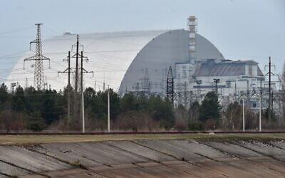 The giant protective dome built over the sarcophagus covering the destroyed fourth reactor of the Chernobyl Nuclear Power Plant, April 13, 2021. (Sergei Supinsky/ AFP/ File)
