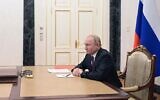 Russian President Vladimir Putin chairs a Security Council meeting via a video link in Moscow on February 25, 2022. (Alexey NIKOLSKY / SPUTNIK / AFP)