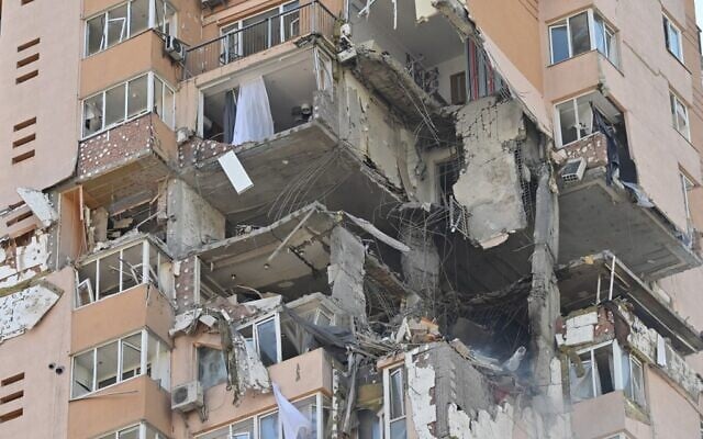 A view of a high-rise apartment block, which was hit by recent shelling in Kyiv, on February 26, 2022. (Genya Savilov/AFP) A view of a high-rise apartment block, which was hit by recent shelling in Kyiv, on February 26, 2022. (Genya Savilov/AFP)
