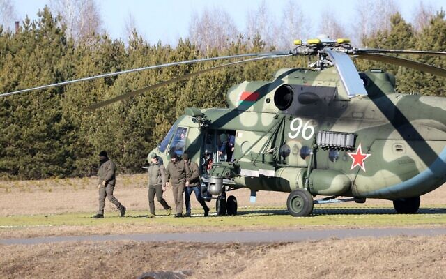 Ukrainian Defence Minister Oleksii Reznikov (2L) arrives to attend the talks between delegations from Ukraine and Russia in Belarus' Gomel region on February 28, 2022, following the Russian invasion of Ukraine. (Photo by Sergei KHOLODILIN / BELTA / AFP) / Belarus OUT Ukrainian Defence Minister Oleksii Reznikov (2L) arrives to attend the talks between delegations from Ukraine and Russia in Belarus' Gomel region on February 28, 2022, following the Russian invasion of Ukraine. (Photo by Sergei KHOLODILIN / BELTA / AFP) / Belarus OUT