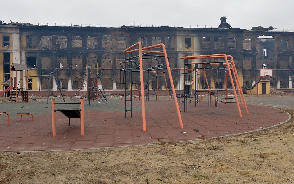 This photograph shows a view of a school destroyed as a result of fight not far from the center of Ukrainian city of Kharkiv, located some 50 km from Ukrainian-Russian border, on February 28, 2022. (Photo by Sergey BOBOK / AFP)