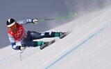 Israel's Barnabas Szollos competes in the men's downhill final during the Beijing 2022 Winter Olympic Games at the Yanqing National Alpine Skiing Centre in Yanqing on February 7, 2022. (Fabrice COFFRINI / AFP)