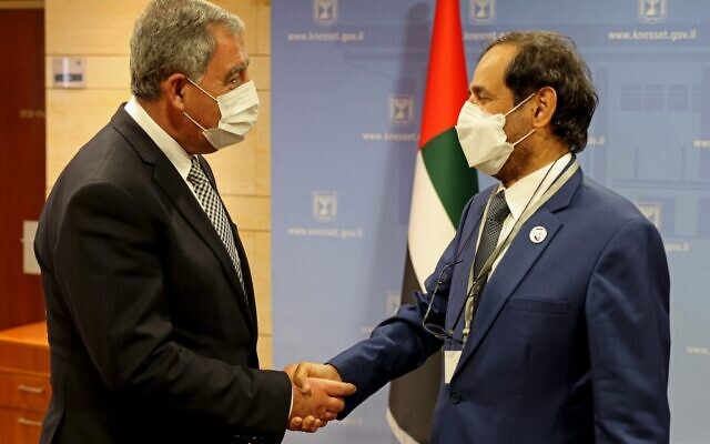 Knesset Speaker Mickey Levy (L) welcomes Ali Rashid al-Nuaimi — chairman of the Defense, Interior and Foreign Affairs Committee in the United Arab Emirates' (UAE's) Federal National Council on a visit to Israel's parliament in Jerusalem on February 7, 2022. (Menahem KAHANA / AFP) Knesset Speaker Mickey Levy (L) welcomes Ali Rashid al-Nuaimi — chairman of the Defense, Interior and Foreign Affairs Committee in the United Arab Emirates' (UAE's) Federal National Council on a visit to Israel's parliament in Jerusalem on February 7, 2022. (Menahem KAHANA / AFP)