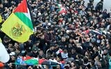 Mourners attend the funeral of three Palestinians killed by Israeli forces during a raid against what Israel described as a terrorist cell, on February 8, 2022, in the West Bank city of Nablus. (Jaafar Ashitiyeh/AFP)