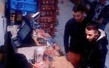 This file video grab taken from a CCTV camera at a petrol station in Ressons, North of Paris, on November 11, 2015, shows Salah Abdeslam (R), a suspect in the Paris attack of November 13, and Mohammed Abrini (C) buying goods (OFF / AFP)