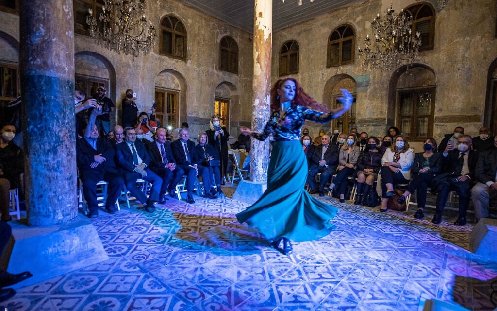 Dignitaries and Jewish community members watch a dancer perform at the Izmir Sephardic Cultural Festival in Izmir, Turkey, November 30, 2021. (Courtesy of Izmir Metropolitan Municipality/ via JTA)