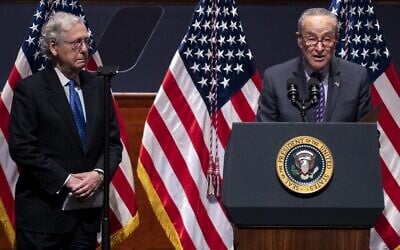 US Senate Majority Leader Charles Schumer (R) and Minority Leader Mitch McConnell address the National Prayer Breakfast at the US Capitol in Washington on February 3, 2022. (Greg Nash-Pool/Getty Images/AFP)