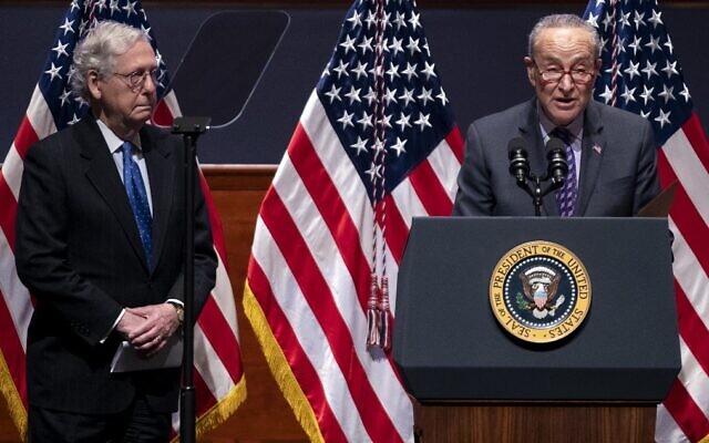 US Senate Majority Leader Charles Schumer (R) and Minority Leader Mitch McConnell address the National Prayer Breakfast at the US Capitol in Washington on February 3, 2022. (Greg Nash-Pool/Getty Images/AFP) US Senate Majority Leader Charles Schumer (R) and Minority Leader Mitch McConnell address the National Prayer Breakfast at the US Capitol in Washington on February 3, 2022. (Greg Nash-Pool/Getty Images/AFP)