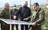 Defense Minister Benny Gantz, center, meets with top IDF officers during a tour of the West Bank, on February 1, 2022. (Ariel Hermoni/Defense Ministry)