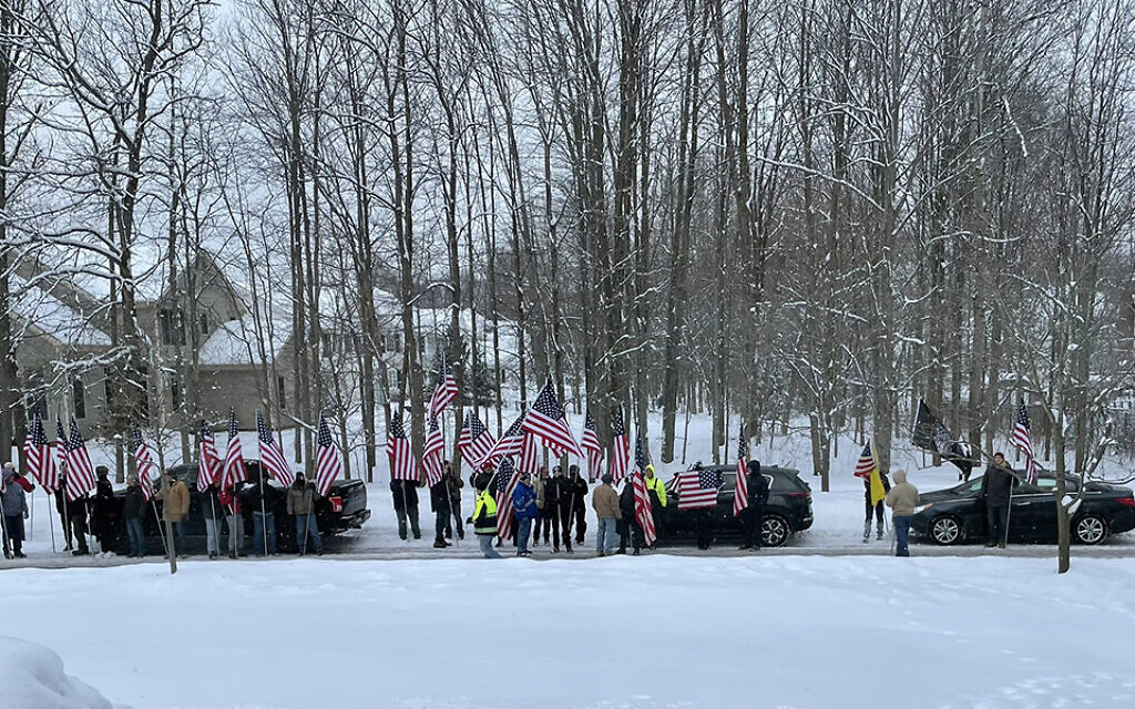A group of men protest outside of Rep. Casey Weinstein’s home. (Courtesy: Cleveland Jewish News/via JTA) A group of men protest outside of Rep. Casey Weinstein’s home. (Courtesy: Cleveland Jewish News/via JTA)