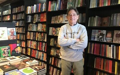 Ezra Goldstein has been carefully selecting and stocking books at Community Bookstore since he took over the shop in Brooklyn's Park Slope neighborhood in 2009. (Julia Gergely/ JTA)