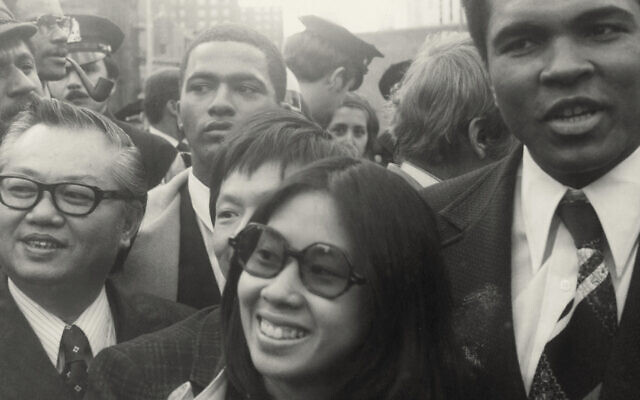 Emile Bocian took many shots capturing excitement around the neighborhood, like when Muhammad Ali was honored in New York's Chinatown on December 9, 1974. (Emile Bocian, Courtesy of Center for Jewish History/JTA)