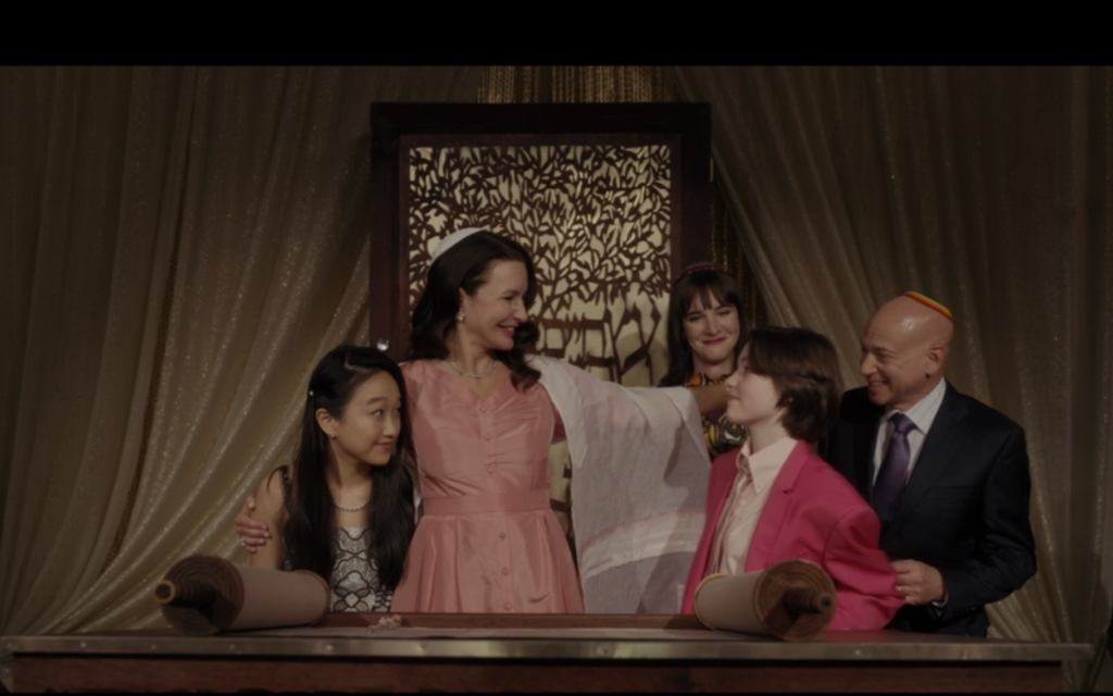 The Goldenblatt family gathers with Rabbi Jen, played by Hari Nef, on the finale of HBO's "Sex and the City" reboot. (Screen capture via JTA) The Goldenblatt family gathers with Rabbi Jen, played by Hari Nef, on the finale of HBO's "Sex and the City" reboot. (Screen capture via JTA)