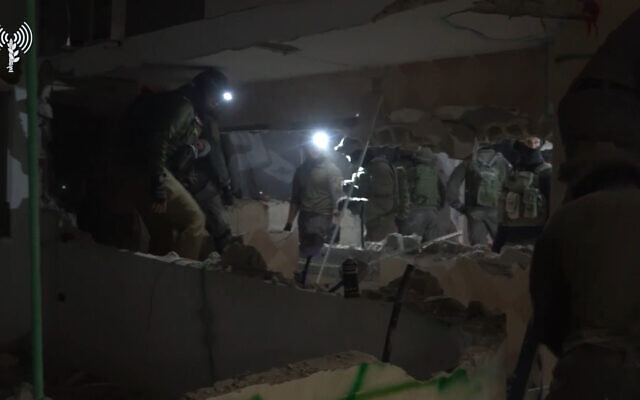 IDF soldiers demolish the home of an alleged terrorist in the West Bank Palestinian town of Silat al-Harithiya, February 14, 2022. (Israel Defense Forces) IDF soldiers demolish the home of an alleged terrorist in the West Bank Palestinian town of Silat al-Harithiya, February 14, 2022. (Israel Defense Forces)