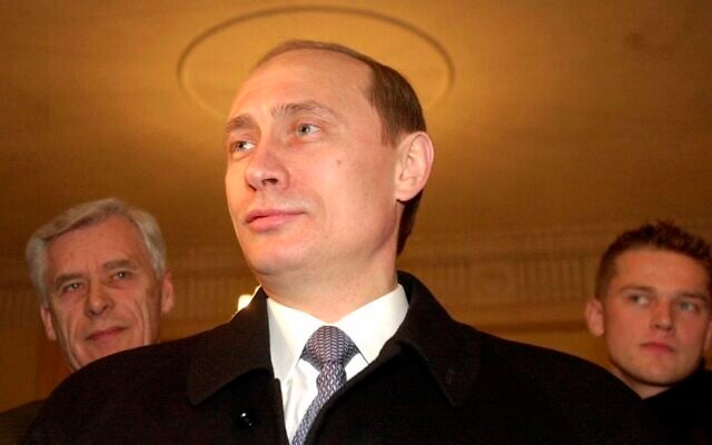 In this file photo taken on Sunday, March 26, 2000, Acting Russian President and Presidential candidate Vladimir Putin talks with representatives of the news media at a polling station in Moscow, Russia (AP Photo/ Alexander Zemlianichenko, file) In this file photo taken on Sunday, March 26, 2000, Acting Russian President and Presidential candidate Vladimir Putin talks with representatives of the news media at a polling station in Moscow, Russia (AP Photo/ Alexander Zemlianichenko, file)