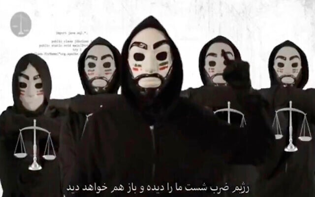 In this screenshot from video, a purported dissident message is seen from an online account calling itself 'The Justice of Ali' that reportedly played overtop of an Iranian state television streaming feed on Feb. 1, 2022 (AP Photo) In this screenshot from video, a purported dissident message is seen from an online account calling itself 'The Justice of Ali' that reportedly played overtop of an Iranian state television streaming feed on Feb. 1, 2022 (AP Photo)