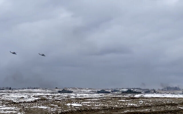 In this photo taken from video and released by the Russian Defense Ministry Press Service on February 2, 2022, Russian and Belarusian tanks and military helicopters attend a joint military drills at Brestsky firing range, Belarus. (Russian Defense Ministry Press Service via AP) In this photo taken from video and released by the Russian Defense Ministry Press Service on February 2, 2022, Russian and Belarusian tanks and military helicopters attend a joint military drills at Brestsky firing range, Belarus. (Russian Defense Ministry Press Service via AP)