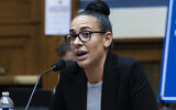 Emily Applegate, former marketing coordinator, premium client services and coordinator, ticket sales representative for the NFL's Washington Football Team, testifies before the House Oversight Committee during a roundtable "Examining the Washington Football Team's Toxic Workplace Culture" on Capitol Hill in Washington, Wednesday, Feb. 3, 2022. (Graeme Jennings/Pool via AP)