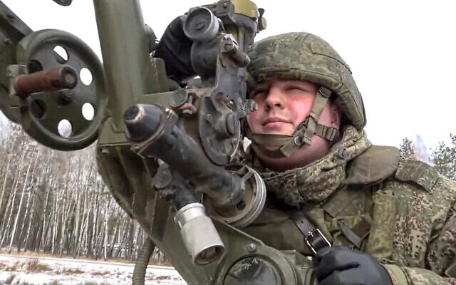 In this photo taken from video and released by the Russian Defense Ministry Press Service on February 4, 2022, a soldier takes part in the Belarusian and Russian joint military drills at Brestsky firing range, Belarus. (Russian Defense Ministry Press Service via AP) In this photo taken from video and released by the Russian Defense Ministry Press Service on February 4, 2022, a soldier takes part in the Belarusian and Russian joint military drills at Brestsky firing range, Belarus. (Russian Defense Ministry Press Service via AP)
