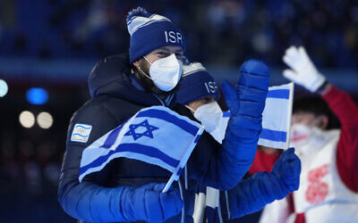 Athletes from Israel march into the stadium during the opening ceremony of the 2022 Winter Olympics, Friday, Feb. 4, 2022, in Beijing. (AP Photo/Natacha Pisarenko)
