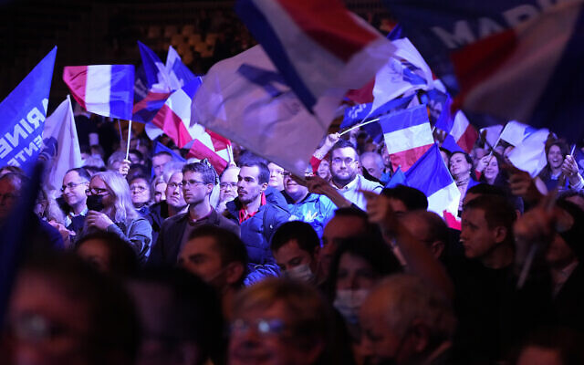 Supporters of French far right presidential candidate Marine Le Pen wave flags during a campaign rally, Feb. 5, 2022 in Reims, eastern France (AP Photo/Michel Euler) Supporters of French far right presidential candidate Marine Le Pen wave flags during a campaign rally, Feb. 5, 2022 in Reims, eastern France (AP Photo/Michel Euler)