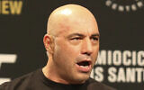 Joe Rogan is seen during a weigh-in before UFC 211 on May 12, 2017, in Dallas before UFC 211. ( AP Photo/Gregory Payan, File)