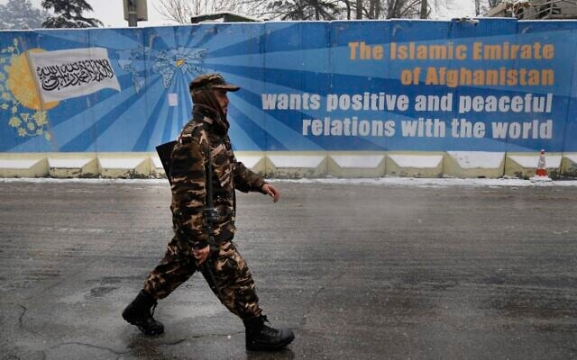 A Taliban fighter with his gun walks on a street, in Kabul, Afghanistan, Sunday, Feb. 6, 2022. (AP Photo/Hussein Malla) A Taliban fighter with his gun walks on a street, in Kabul, Afghanistan, Sunday, Feb. 6, 2022. (AP Photo/Hussein Malla)