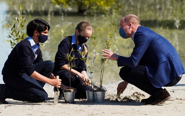 Britain's Prince William talks to British School Al-Khubairat students Amaan Haider, 13, left, and Lilly-Rose Mayall, 12, at the Al-Jubail Mangrove Park in Abu Dhabi, United Arab Emirates, February 10, 2022. (AP Photo/Jon Gambrell) Britain's Prince William talks to British School Al-Khubairat students Amaan Haider, 13, left, and Lilly-Rose Mayall, 12, at the Al-Jubail Mangrove Park in Abu Dhabi, United Arab Emirates, February 10, 2022. (AP Photo/Jon Gambrell)