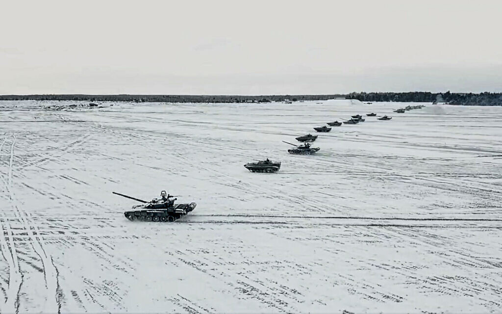 In this photo taken from video and released by the Russian Defense Ministry Press Service on Friday, Feb. 4, 2022, tanks and armored vehicles move during the Belarusian and Russian joint military drills at Brestsky firing range, Belarus. (Russian Defense Ministry Press Service via AP, File) In this photo taken from video and released by the Russian Defense Ministry Press Service on Friday, Feb. 4, 2022, tanks and armored vehicles move during the Belarusian and Russian joint military drills at Brestsky firing range, Belarus. (Russian Defense Ministry Press Service via AP, File)
