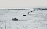 In this photo taken from video and released by the Russian Defense Ministry Press Service on Friday, Feb. 4, 2022, tanks and armored vehicles move during the Belarusian and Russian joint military drills at Brestsky firing range, Belarus. (Russian Defense Ministry Press Service via AP, File)