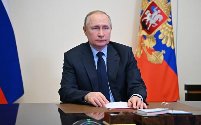 Russian President Vladimir Putin chairs a Security Council meeting via videoconference at the Novo-Ogaryovo residence outside Moscow, Russia, on Friday, February 11, 2022. (Alexei Nikolsky, Sputnik, Kremlin Pool Photo via AP)