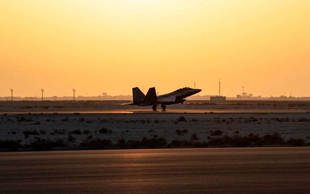 In this photo released by the US Air Force, a US Air Force F-22 Raptor arrives at Al-Dhafra Air Base in Abu Dhabi, United Arab Emirates, February 12, 2022. (Tech Sgt. Chelsea E. FitzPatrick/U.S. Air Force via AP)