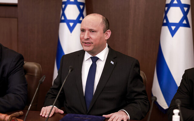 Prime Minister Naftali Bennett chairs the weekly cabinet meeting at the Prime Minister's office in Jerusalem, Feb. 13, 2022. (Menahem Kahana/Pool via AP) Prime Minister Naftali Bennett chairs the weekly cabinet meeting at the Prime Minister's office in Jerusalem, Feb. 13, 2022. (Menahem Kahana/Pool via AP)