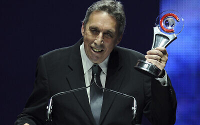 Director Ivan Reitman accepts the Lifetime Achievement Award at the Big Screen Achievement Awards at CinemaCon 2014 on March 27, 2014 in Las Vegas. Reitman, the influential filmmaker and producer behind beloved comedies from “Animal House” to “Ghostbusters,” has died.  Reitman passed away peacefully in his sleep Saturday night, Feb. 12, 2022, at his home in Montecito, Calif., his family told The Associated Press.  He was 75. (Photo by Chris Pizzello/Invision/AP, File)