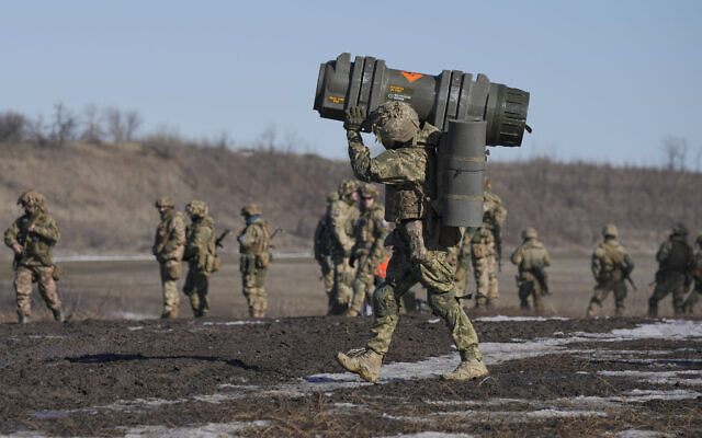 A Ukrainian serviceman carries an NLAW anti-tank weapon during an exercise in the Joint Forces Operation, in the Donetsk region, eastern Ukraine, February 15, 2022. (AP/Vadim Ghirda, File) A Ukrainian serviceman carries an NLAW anti-tank weapon during an exercise in the Joint Forces Operation, in the Donetsk region, eastern Ukraine, February 15, 2022. (AP/Vadim Ghirda, File)