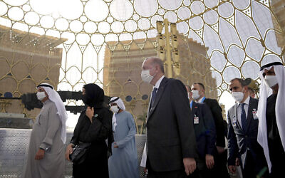 Turkish President Recep Tayyip Erdogan (center) visits the Dubai Expo 2020 for a Turkish national day ceremony, in Dubai, United Arab Emirates, on February 15, 2022. (AP Photo/Ebrahim Noroozi)