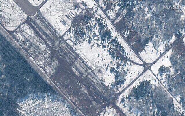 This February 15, 2022 satellite image provided by Maxar Technologies shows an area where troops and equipment departed from Zyabrovka airfield in Belarus. (Satellite image ©2022 Maxar Technologies via AP) This February 15, 2022 satellite image provided by Maxar Technologies shows an area where troops and equipment departed from Zyabrovka airfield in Belarus. (Satellite image ©2022 Maxar Technologies via AP)