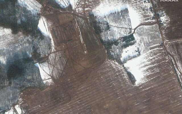 This February 16, 2022 satellite image provided by Maxar Technologies shows largely empty military deployment areas at Rechitsa in Belarus. (Satellite image ©2022 Maxar Technologies via AP) This February 16, 2022 satellite image provided by Maxar Technologies shows largely empty military deployment areas at Rechitsa in Belarus. (Satellite image ©2022 Maxar Technologies via AP)