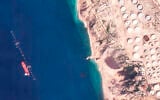 In this satellite photo provided by Planet Labs PBC, a vessel identified as the Virgo by the advocacy group United Against Nuclear Iran is seen off Khargh Island, Iran, on Jan. 16, 2022. (Planet Labs PBC via AP)