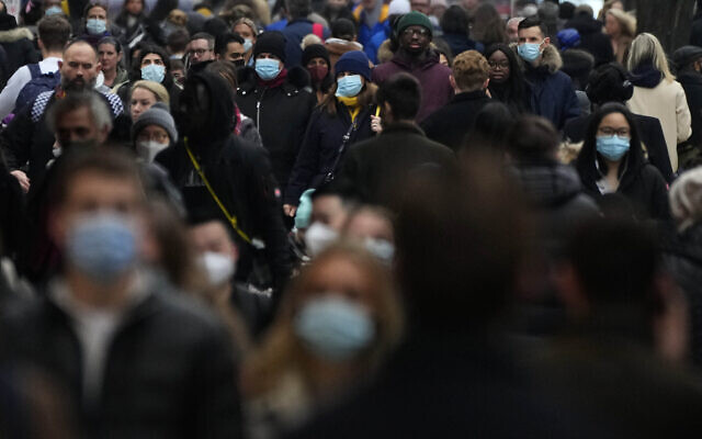 Shoppers walk down Oxford Street, Europe's busiest shopping street, in London, Dec. 23, 2021 (AP Photo/Frank Augstein, File) Shoppers walk down Oxford Street, Europe's busiest shopping street, in London, Dec. 23, 2021 (AP Photo/Frank Augstein, File)