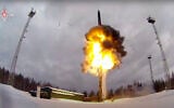 This photo taken from video provided by the Russian Defense Ministry Press Service, on February 19, 2022, shows a Yars intercontinental ballistic missile being launched from an airfield during military drills. (Russian Defense Ministry Press Service via AP)
