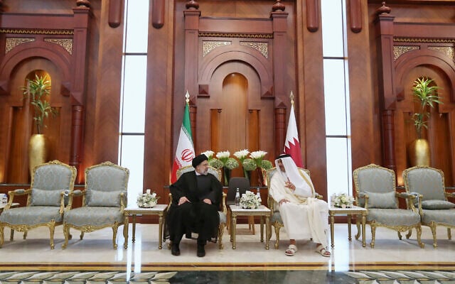 Iranian President Ebrahim Raisi, left, listens to Qatari Emir Tamim bin Hamad Al Thani, in Doha, Qatar, February 21, 2022. (Iranian Presidency Office via AP) Iranian President Ebrahim Raisi, left, listens to Qatari Emir Tamim bin Hamad Al Thani, in Doha, Qatar, February 21, 2022. (Iranian Presidency Office via AP)
