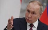 Russian President Vladimir Putin speaks during a news conference in Moscow, Russia, on February 1, 2022. (Yuri Kochetkov/Pool Photo via AP, File)