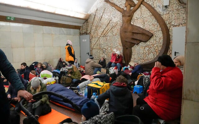 People gather in the Kyiv subway, using it as a bomb shelter in Kyiv, Ukraine, February 25, 2022. (AP Photo/Efrem Lukatsky) People gather in the Kyiv subway, using it as a bomb shelter in Kyiv, Ukraine, February 25, 2022. (AP Photo/Efrem Lukatsky)