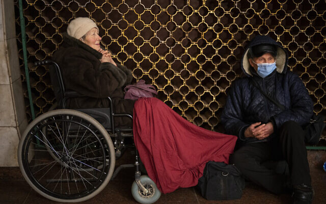 Vladimir, 70, and his wife Tamara, 80, sit in the Kyiv subway, using it as a bomb shelter in Kyiv, Ukraine, on February 24, 2022. (AP Photo/Emilio Morenatti) Vladimir, 70, and his wife Tamara, 80, sit in the Kyiv subway, using it as a bomb shelter in Kyiv, Ukraine, on February 24, 2022. (AP Photo/Emilio Morenatti)