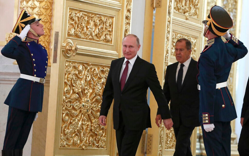 Russian President Vladimir Putin and Foreign Minister Sergei Lavrov walk past honor guards as they attend a ceremony to receive diplomatic credentials from newly appointed foreign ambassadors at the Kremlin in Moscow, Russia, on Thursday, October 11, 2018. In the wake of the 2022 invasion of Ukraine, US sanctions are targeting Putin and a handful of individuals believed to be among his closest security advisers, including Lavrov. (Sergei Karpukhin/Pool Photo via AP, File) Russian President Vladimir Putin and Foreign Minister Sergei Lavrov walk past honor guards as they attend a ceremony to receive diplomatic credentials from newly appointed foreign ambassadors at the Kremlin in Moscow, Russia, on Thursday, October 11, 2018. In the wake of the 2022 invasion of Ukraine, US sanctions are targeting Putin and a handful of individuals believed to be among his closest security advisers, including Lavrov. (Sergei Karpukhin/Pool Photo via AP, File)