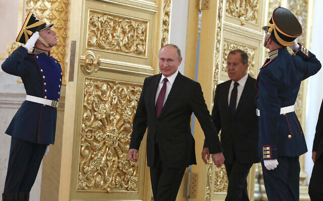 Russian President Vladimir Putin and Foreign Minister Sergei Lavrov walk past honor guards as they attend a ceremony to receive diplomatic credentials from newly appointed foreign ambassadors at the Kremlin in Moscow, Russia, on Thursday, October 11, 2018. In the wake of the 2022 invasion of Ukraine, US sanctions are targeting Putin and a handful of individuals believed to be among his closest security advisers, including Lavrov. (Sergei Karpukhin/Pool Photo via AP, File) Russian President Vladimir Putin and Foreign Minister Sergei Lavrov walk past honor guards as they attend a ceremony to receive diplomatic credentials from newly appointed foreign ambassadors at the Kremlin in Moscow, Russia, on Thursday, October 11, 2018. In the wake of the 2022 invasion of Ukraine, US sanctions are targeting Putin and a handful of individuals believed to be among his closest security advisers, including Lavrov. (Sergei Karpukhin/Pool Photo via AP, File)